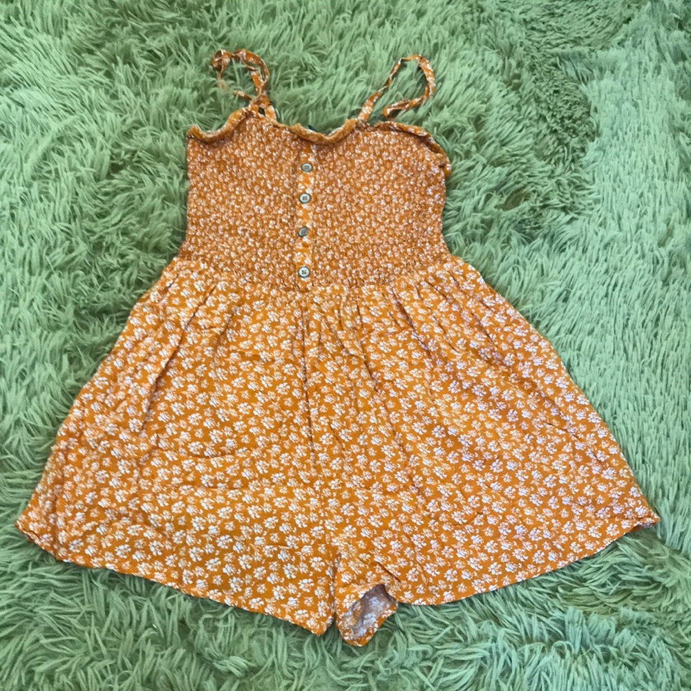 orange/yellow jumper